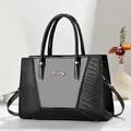 Women's black faux crocodile embossed large tote bag with top handles and strap - Black