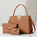 Three-piece brown woven tote bag set with metal B buckle and matching clutch pouches - Earthy Yellow