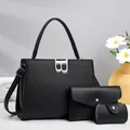 Black pebble leather three-piece handbag set featuring metal clasp and shoulder strap - Black