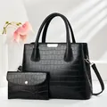 Chic black crocodile embossed tote bag set with matching envelope pouch and gold hardware - Black