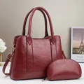 Large burgundy tote bag with matching pouch, premium faux leather with gold hardware detail - Red