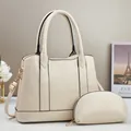 Large beige textured faux leather tote bag set with matching pouch and gold hardware - Off White