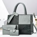 Detailed view of the three-piece handbag set featuring crocodile pattern and matte panels - 30x12x23cm / Crocodile Pattern Patchwork Tote Handbag And Purse And Card Holder / Green