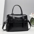 Vintage black faux leather briefcase tote bag with silver metal buckles and top handle - Black