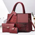 Detail view of burgundy three-piece bag set showing crocodile pattern and smooth texture - 30x12x23cm / Crocodile Pattern Patchwork Tote Handbag And Purse And Card Holder / Wine Red
