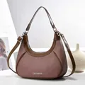 Detail of hobo crescent bag in brown and beige woven fabric with leather strap - Coffee