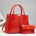 Red crocodile embossed patent leather handbag set with matching clutch and gold metal detail - Handbag And Pouch / Red