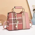 Pink and beige color block plaid handbag with gold metal handles and pearl charm - Pink