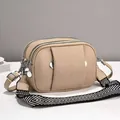 Sac bandoulière kaki multicouche texture litchi et large bandoulière rayée - Kaki