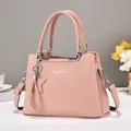 Pale pink lychee grain leather tote bag with star pendant and silver hardware - Pink