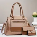 Detail of three-piece tote set with crocodile texture and bicolor faux leather finish - Khaki