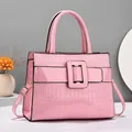 Pink stone pattern handbag with large square buckle and adjustable shoulder strap - Medium / Pink