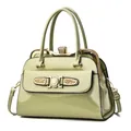 Light green patent leather handbag with rhinestone frame and metallic accents - Green