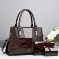 Three-piece dark brown faux crocodile tote bag set with a glossy finish and gold hardware - Coffee