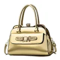 Glossy golden handbag with sparkling diamond inlay and metal buckle for women - Gold