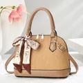 Elegant khaki pleated shell handbag with decorative silk scarf and gold hardware - Khaki