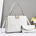 White faux-crocodile tote bag and envelope clutch set with golden B-logo hardware - White