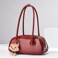 Retro wine red leather shoulder bag with sleek texture and plush doll charm pendant - Red / 31*9*13