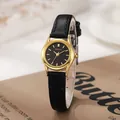 Elegant gouden kwartshorloge met zwarte leren band en minimalistische ronde metalen wijzerplaat - Zwarte Band Gouden Kast Zwarte Wijzerplaat