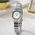 Elegant silver stainless steel ladies watch with tonneau case on a white tray - Silver Band White Dial