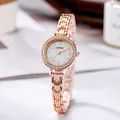Close-up of elegant rose gold watch with crystal bezel and mother of pearl dial - Rose Gold Band Gray Dial