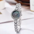Detailed macro view of the silver watch with rhinestone bezel and dark gray mother of pearl dial - Silver Strap Green Dial