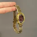Vintage gold quartz watch with a burgundy oval dial and Roman numerals for women - Gold Strap Red Dial