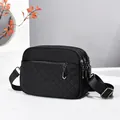 Black quilted crossbody bag with three zipper compartments and adjustable strap - Gunmetal Hardware Quilted Style / Black