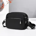 Three-layer black quilted nylon crossbody bag with adjustable strap and silver zippers - Multi-Layer Zipper Plain Style / Black