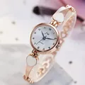 Elegant rose gold quartz watch for women with heart-patterned strap and white dial - Rose Gold Band White Dial