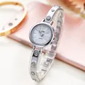 Elegant silver steel quartz watch for women with sparkling rhinestone bangle band - Silver Band White Dial