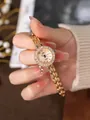 Montre à quartz dorée pour femme avec lunette en strass et bracelet à maillons - Bracelet Or Rose Cadran Or Rose