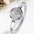 Elegant silver women's bangle watch featuring a sparkling glitter dial and metal strap - Silver Band White Dial