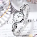 Elegant silver quartz watch for women with heart-shaped bracelet link and white dial - Silver