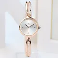 Fashionable rose gold women's bangle watch with a minimalist silver sunray dial - Rose Gold Case White Dial