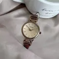 Elegant rose gold quartz watch with slim brown leather strap and champagne sunray dial - Coffee