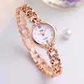 Elegant rose gold quartz bracelet watch with hollow floral strap and crystal dial - Gold