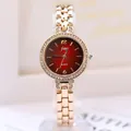 Rose gold quartz watch for women with red radiant dial and rhinestone bezel detail - Rose Gold Band Red Dial