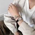 Vintage tonneau horloge in roségoud met lederen band en zilveren schakelarmband - Zwart
