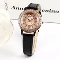 Women's rose gold quartz watch with crystal bezel and black embossed leather strap - Black