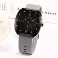 Fashion square sports watch with black dial and grey silicone strap on a desk background - Gray