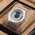 Minimalist swirl dial watch with silver Milanese mesh band on a tan velvet watch pillow - Silver Band Silver Case White Dial