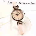 Reloj de cuarzo minimalista para mujer con correa de cuero rosa claro y caja dorada - Rosa