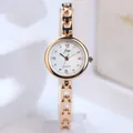 Elegant rose gold women's quartz watch with a white dial and slim chain link bracelet - Gold