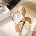 Detail of rose gold quartz watch with beige leather strap and textured white dial - Pink