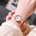Elegant ladies quartz watch with rose gold case and beige leather strap on wrist - Apricot