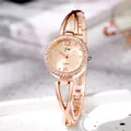 Elegante Damenarmbanduhr in Roségold mit diamantbesetztem Zifferblatt und Armreif - Roségold Goldener Zifferblatt