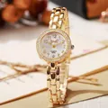 Elegante vergoldete Armbanduhr für Damen mit weißem Zifferblatt und glitzernder Diamantlünette - Gold
