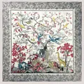 Close-up of Toile de Jouy silk scarf featuring a detailed tree of life and exotic animals - 130cmx130cm / Gray