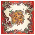 Close-up of colorful paisley silk-like square scarf with red border and satin texture - Red